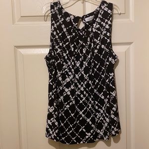 Black and white, sleeveless, business blouse. Calvin Klein size 2X.